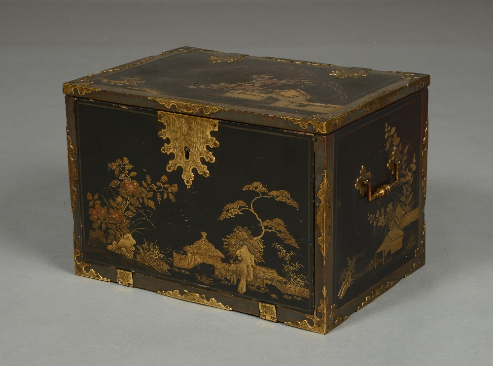 A 18TH/19TH CENTURY BLACK LACQUERED AND GILT CHINOISERIE CHEST having a lift up lid and drop front,