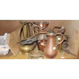 A quantity of brass and copper ware, including WW1 shell cases, jugs, copper kettle, pans,