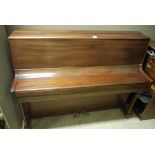 A John Brinsmead and Sons mahogany cased upright piano retailed by Wilson Peck Sheffield