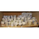 A quantity of modern ceramic mugs, jugs,