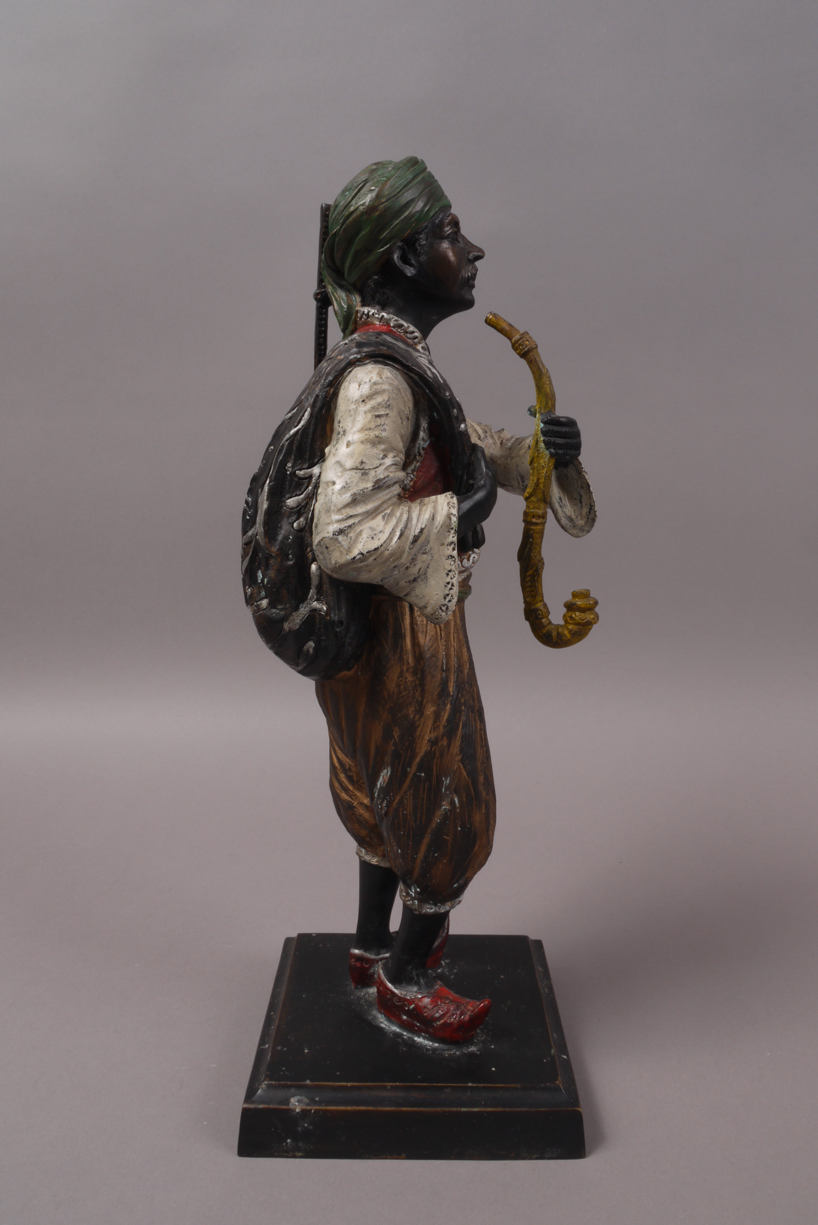 A CONTINENTAL COLD PAINTED BRONZE FIGURE of an Arab in traditional costume, - Image 4 of 6
