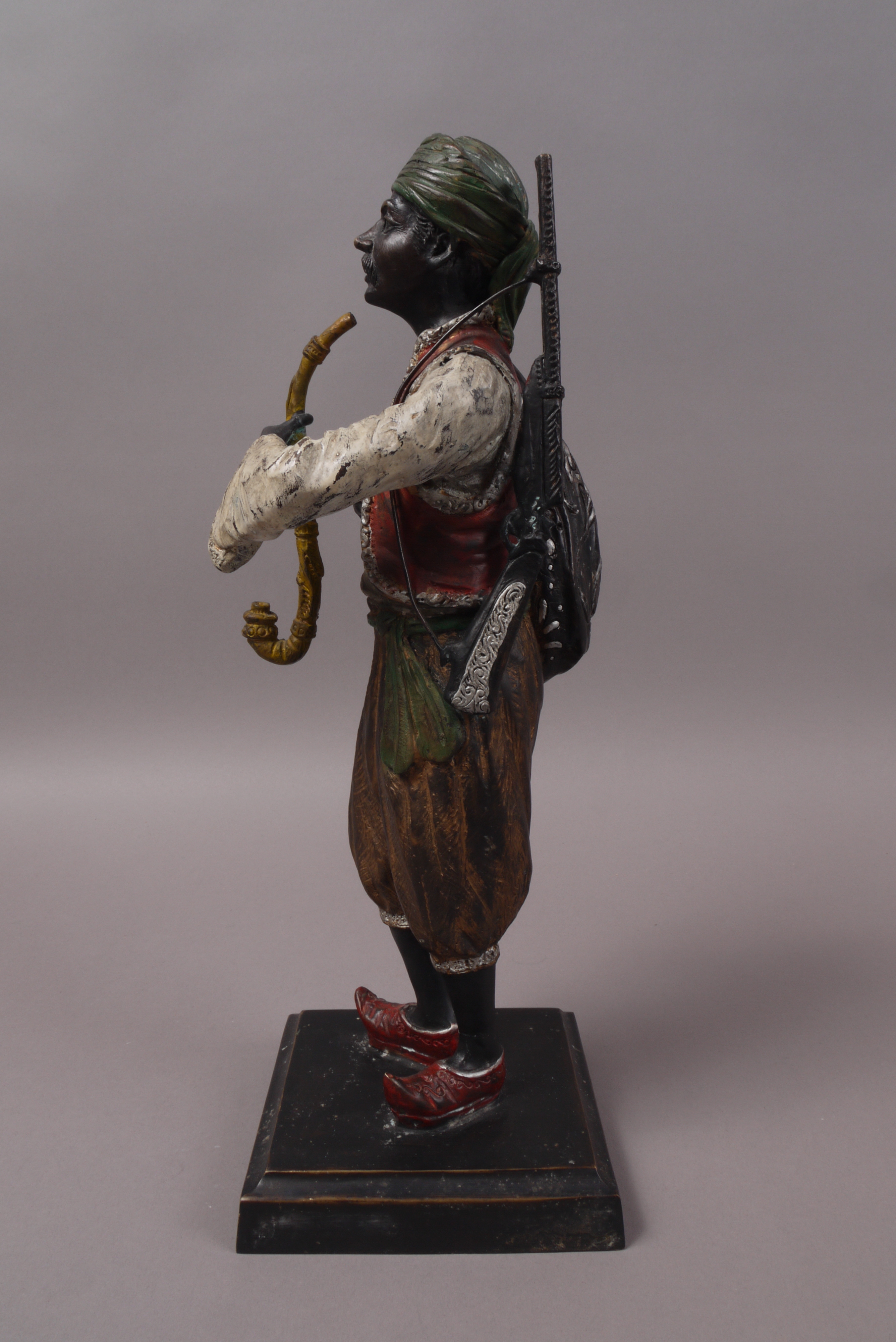 A CONTINENTAL COLD PAINTED BRONZE FIGURE of an Arab in traditional costume, - Image 2 of 6