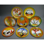 Eight Wedgwood limited edition Clarice Cliff plates with some original paperwork