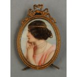 Anon early 20th century portrait miniature of a beauty, in profile, head and shoulders,