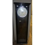 A National Electric wall clock, with cream painted dial and Arabic numerals, ebonised glazed case,
