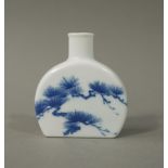 A Chinese semi-circular flask, 20th century, decorated in underglaze blue with pine branches, 9.