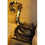 A pair of cast iron bench ends of serpent form