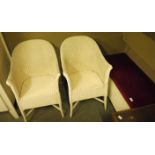 Two Lloyd Loom style tub armchairs;