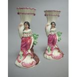 Two similar creamware Cornucopia figural vases,