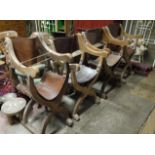 Four Indian hardwood and hide folding X shaped chairs