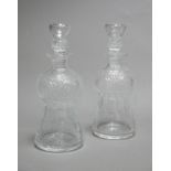 A pair of 20th century thistle form cut glass liqueur decanters each with star cut thistle stoppers