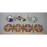 Four Minton and Hollins encaustic style tiles, two cup cane paperweights, cut glass salt,