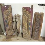 Five pieces of carved Indian hardwood carving with traces of gilt decoration,