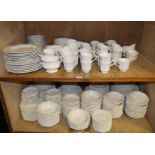 A large quantity of Johnson Brothers dishwasher and microwave safe, white earthenware dinner ware,