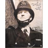 A framed signed photograph of Jack Warner as Dixon of Dock Green with a dedication 'to all my