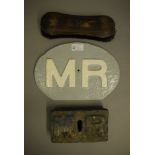 A Midland Railways cast iron oval plate 28cm, a Midland Railways cast iron weight, 18cm,