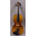 An imported violin with two piece maple back , maple rims, ebonised fingerboard, with label,