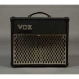 A Vox 'Valve Tronix' portable AD15VT guitar amplifier, together with instruction manual,