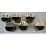 Five Lancashire and Yorkshire wage token tins, three with painted numbers,