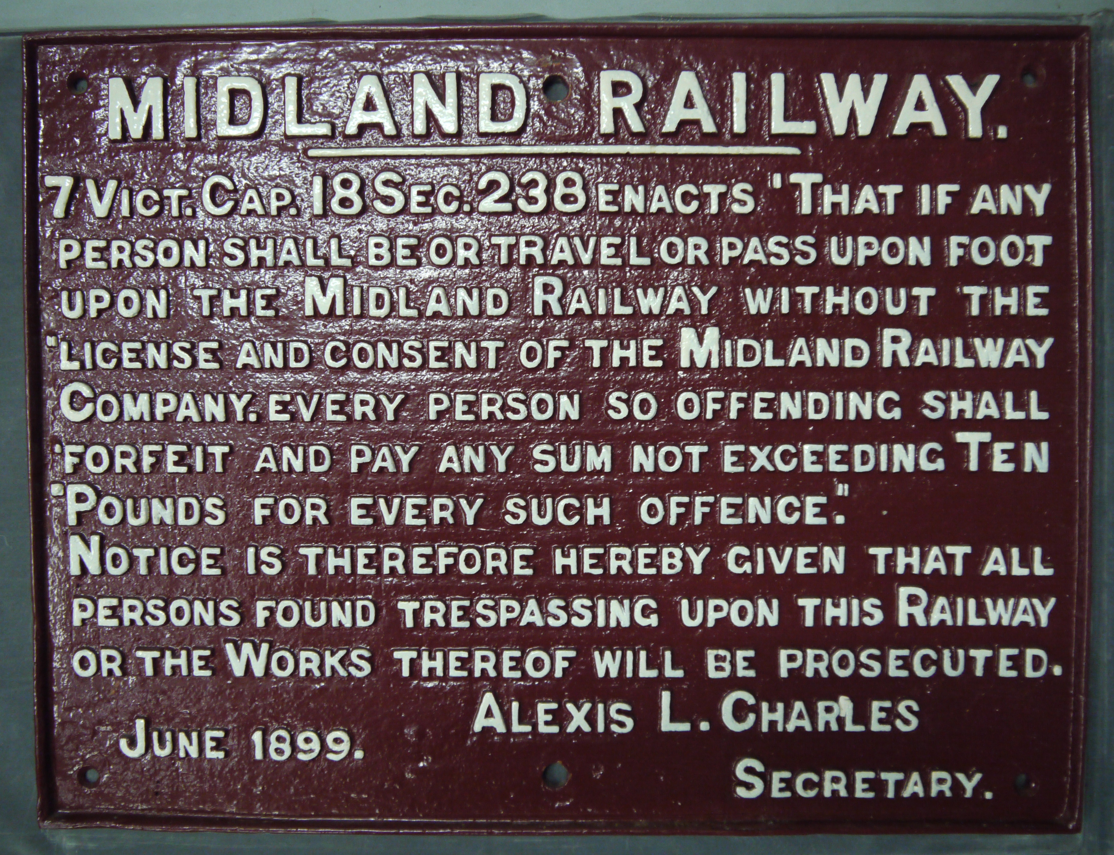 A heavy cast iron Midland Railway Trespass Warning sign dated June 1899,