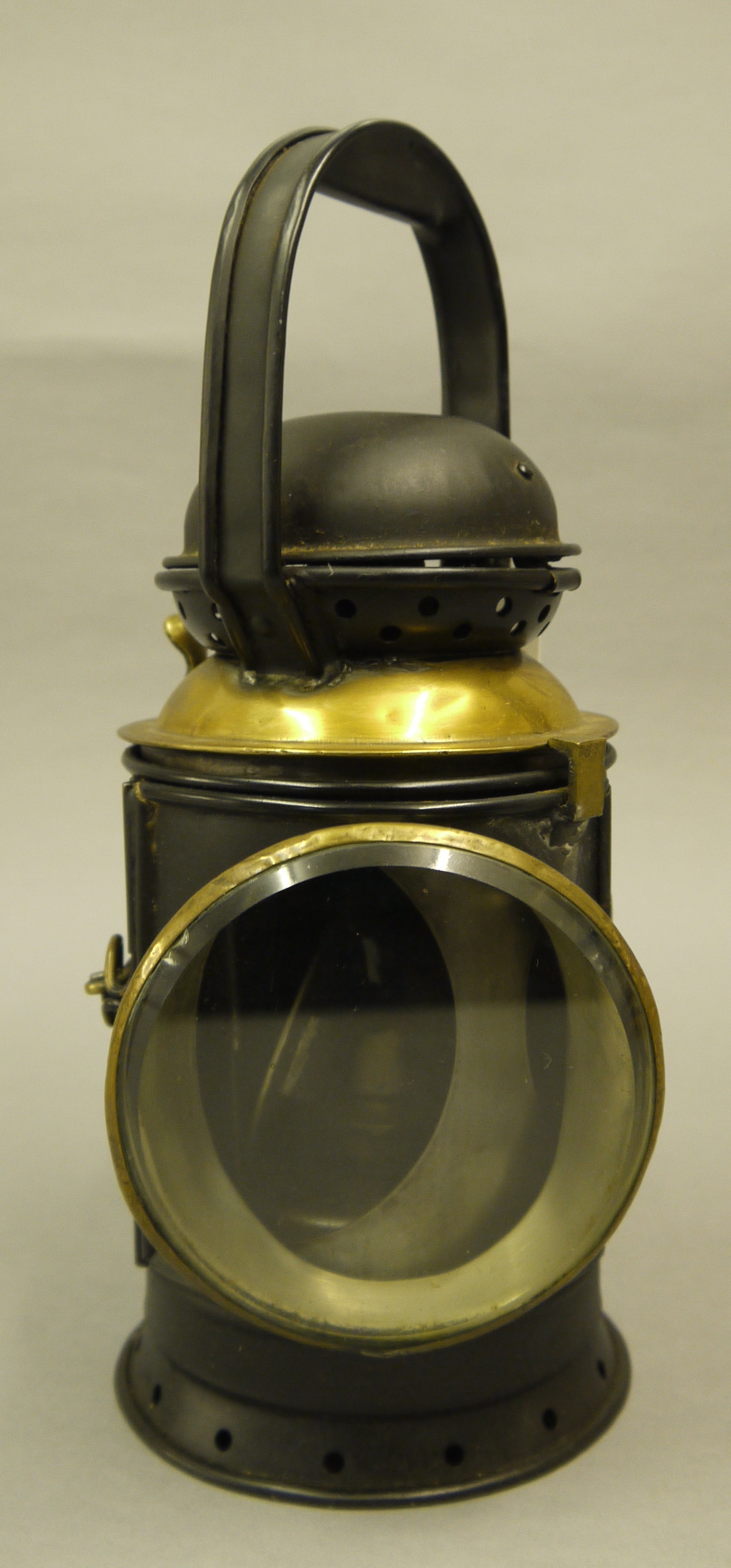 A G.W.R. Railways tin and brass 3 aspect railway lamp, stamped G.PULREY LTD 1945, G.W.