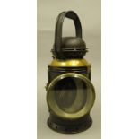 A G.W.R. Railways tin and brass 3 aspect railway lamp, stamped G.PULREY LTD 1945, G.W.