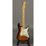 A Fender Japan 50's Stratocaster, serial number A032621, with one piece maple neck,