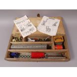 An assortment of Meccano, probably 1930s, in pine box including clockwork motor,
