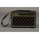 A Vox Escourt twin input portable guitar amplifier, battery/mains operation, single 5" speaker,