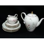 A German Porcelain Floral Decorated Part Tea Set