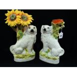 A Pair Of Staffordshire Pottery Seated Dog Spillholder Vases