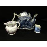 A Blue And White Transfer Decorated Elephant Pattern Tea Pot Together With A Further Transfer
