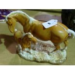 A Beswick Palamino Group Of Horse And Foal (Chips To The Ears)