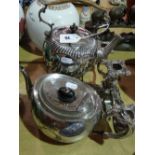 A Silver Plated Spirit Kettle On Stand Together With A Further Teapot And Candelabra