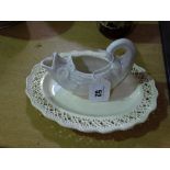 A Creamware Pierced Plate Together With A Fish Shaped Sauce Boat