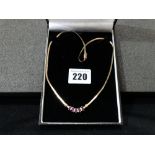 A 14ct Gold Ruby And Diamond Set Necklace