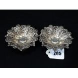 A Pair Of Circular Based Pierced Silver Pin Dishes