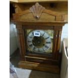 An Edwardian Oak Encased Bracket Clock With Circular Dial