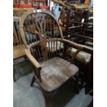 A Windsor Style Spindle And Splat Back Elbow Chair With Hoop Stretcher