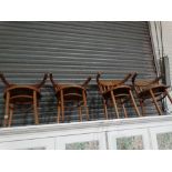 Four Bentwood Elbow Chairs