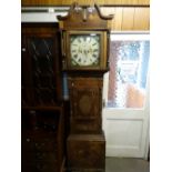 An Antique Oak Encased Long Case Clock, The Hood Enclosing A Square Painted Dial With Eight Day