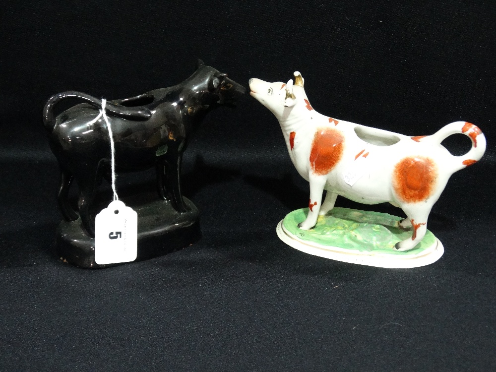 Two Staffordshire Pottery Cow Creamers