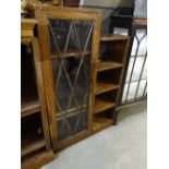 A Polished Oak Single Door Bookcase Cupboard