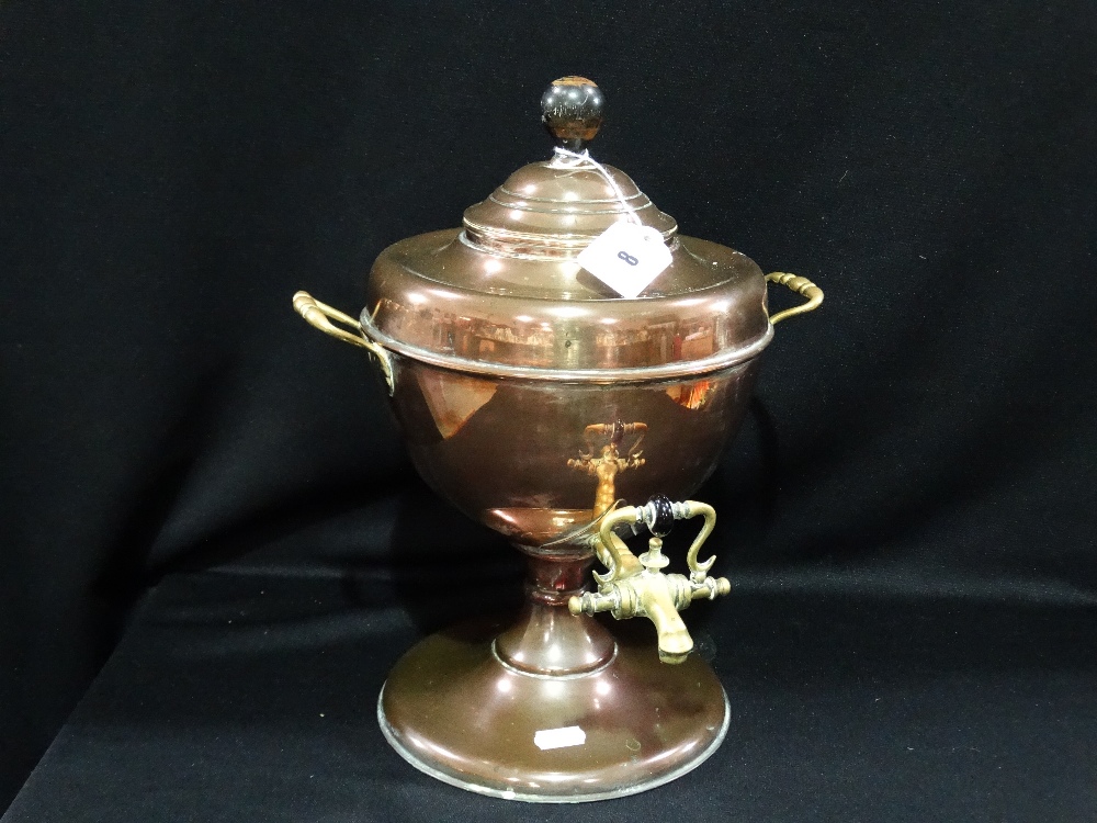 A Circular Based Copper And Brass Urn