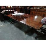 An Antique Mahogany And Cross banded Twin Pedestal Dining Table And Inserts, Brass Claw Feet And