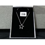 A 14ct White Gold Diamond Set Star Pendant And Chain