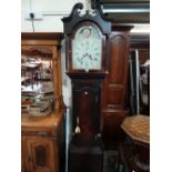 An Antique Mahogany Encased, Long Case Clock , The Hood Enclosing An Arch Painted Dial With Eight