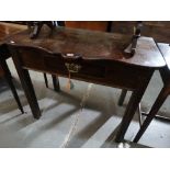 An Antique Oak Single Drawer Side Table On Square Supports