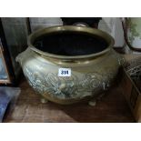 An Early 20th Century Oriental Three Footed Circular Planter With Stylized Dragon Band And Lion Head