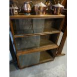 An Oak Finish Stacking Bookcase